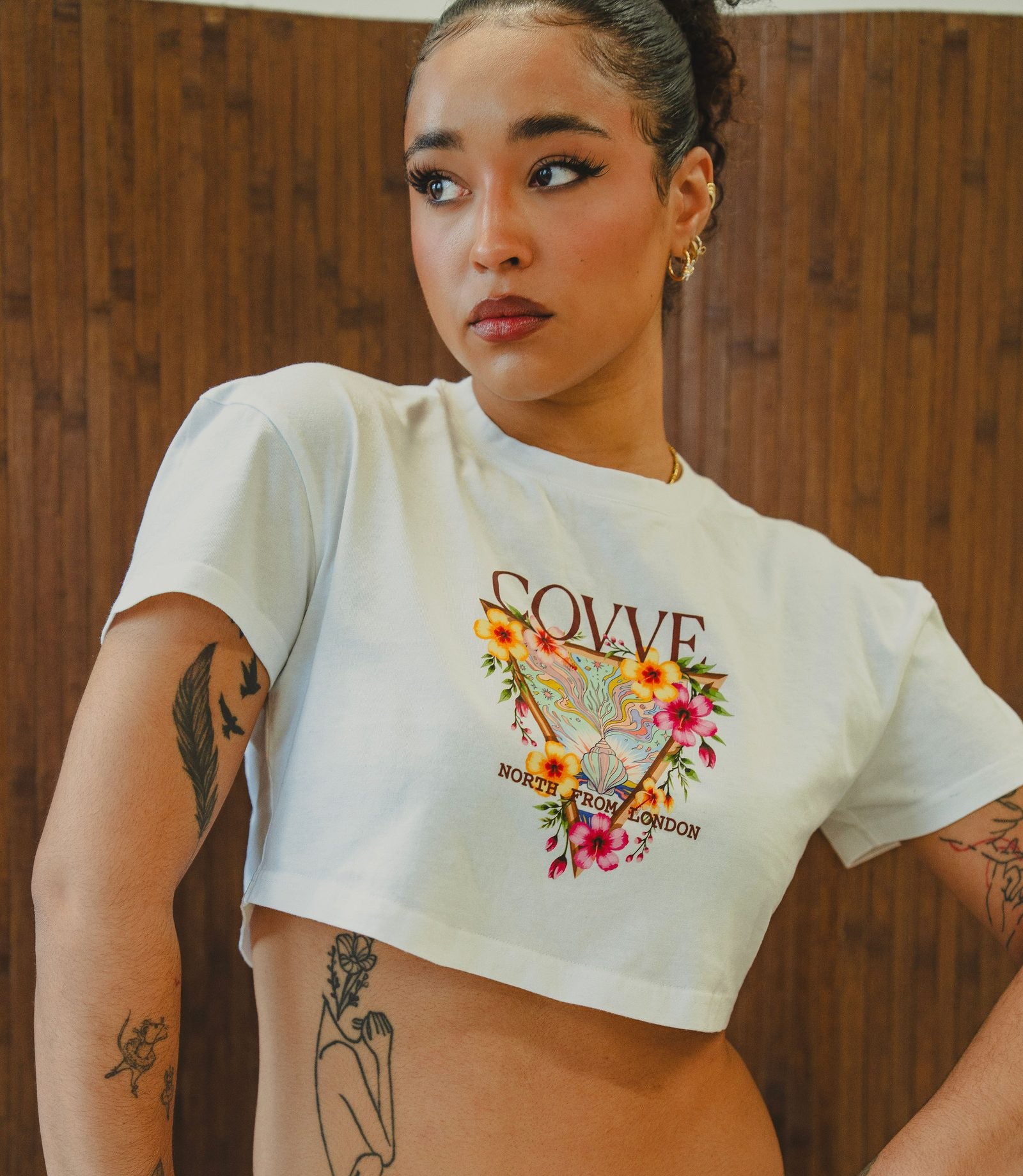 A model wearing the White City Bloom cropped T-shirt