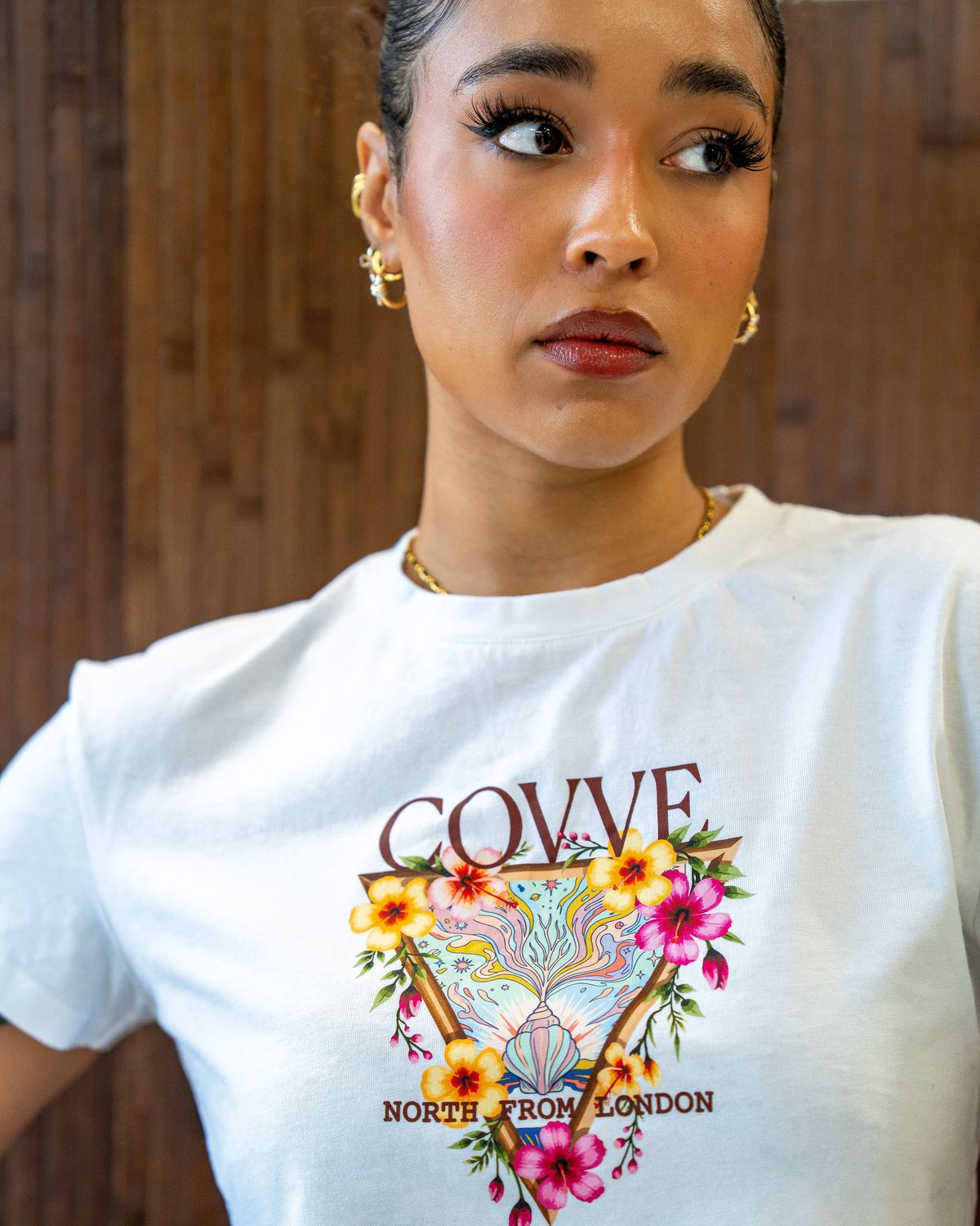 Close-up of the City Bloom print on the white cropped T-shirt